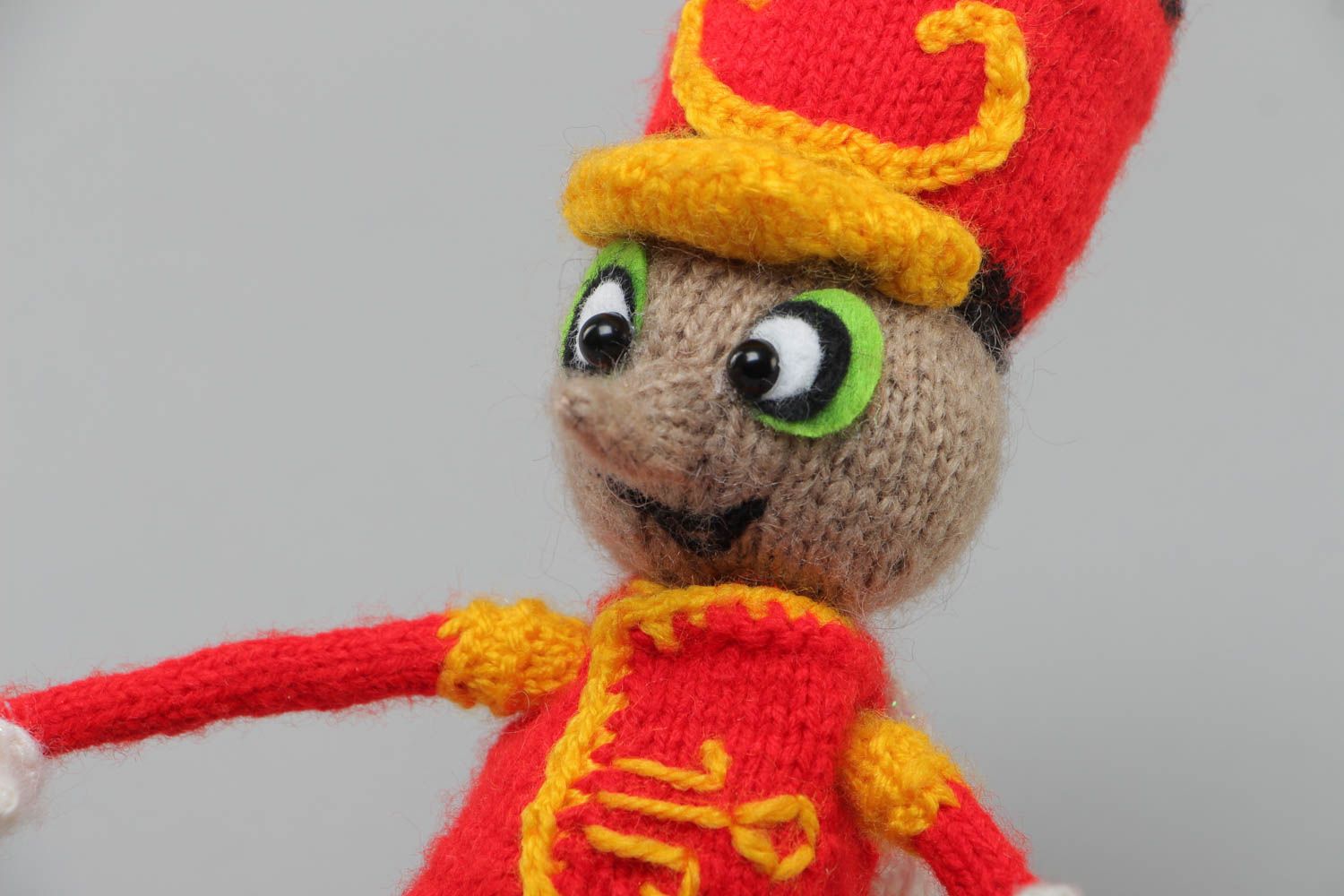 Handmade small soft knit toy in the shape of a mosquito in hussar uniform photo 3