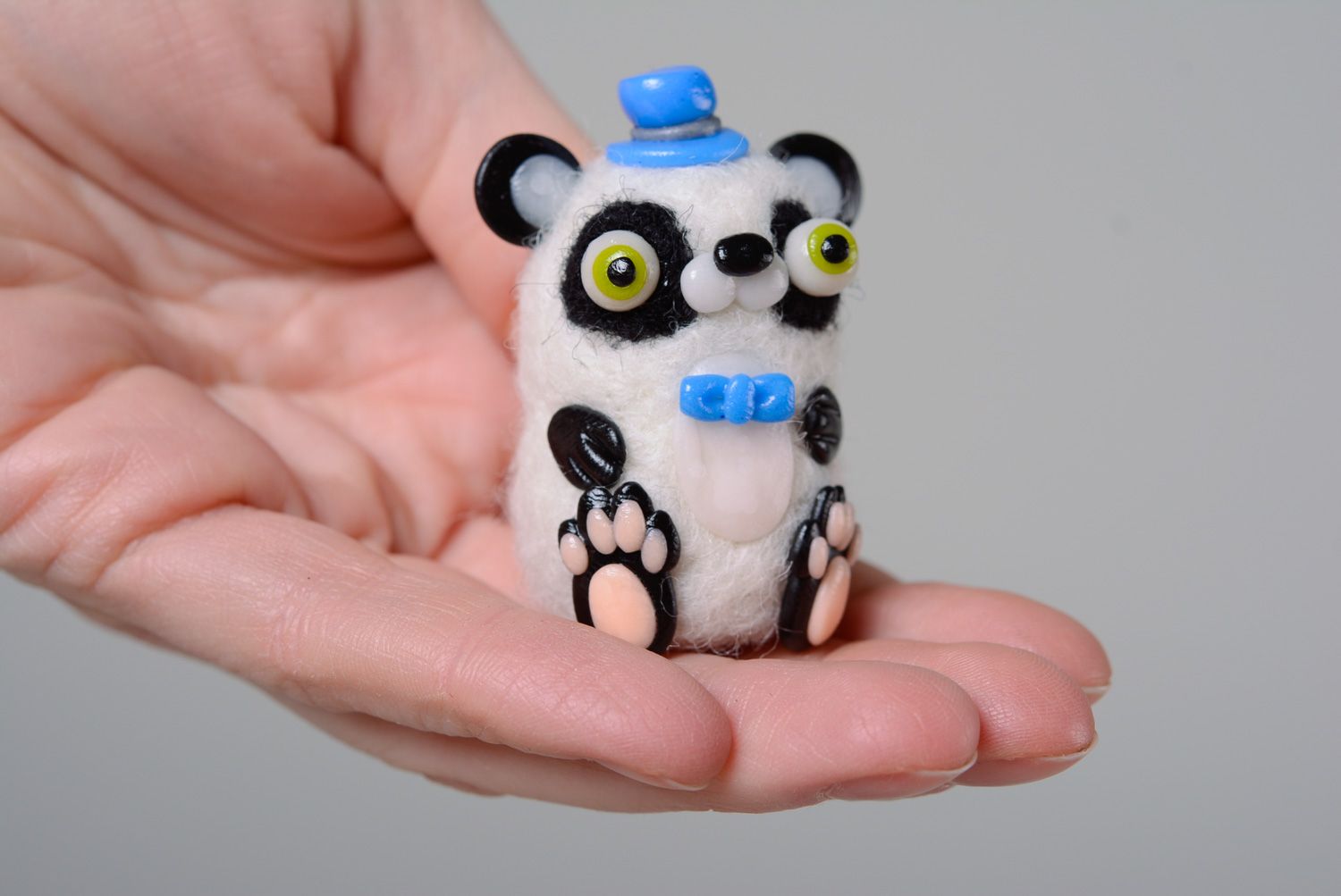 Handmade miniature wool toy panda made using needle felting technique photo 5