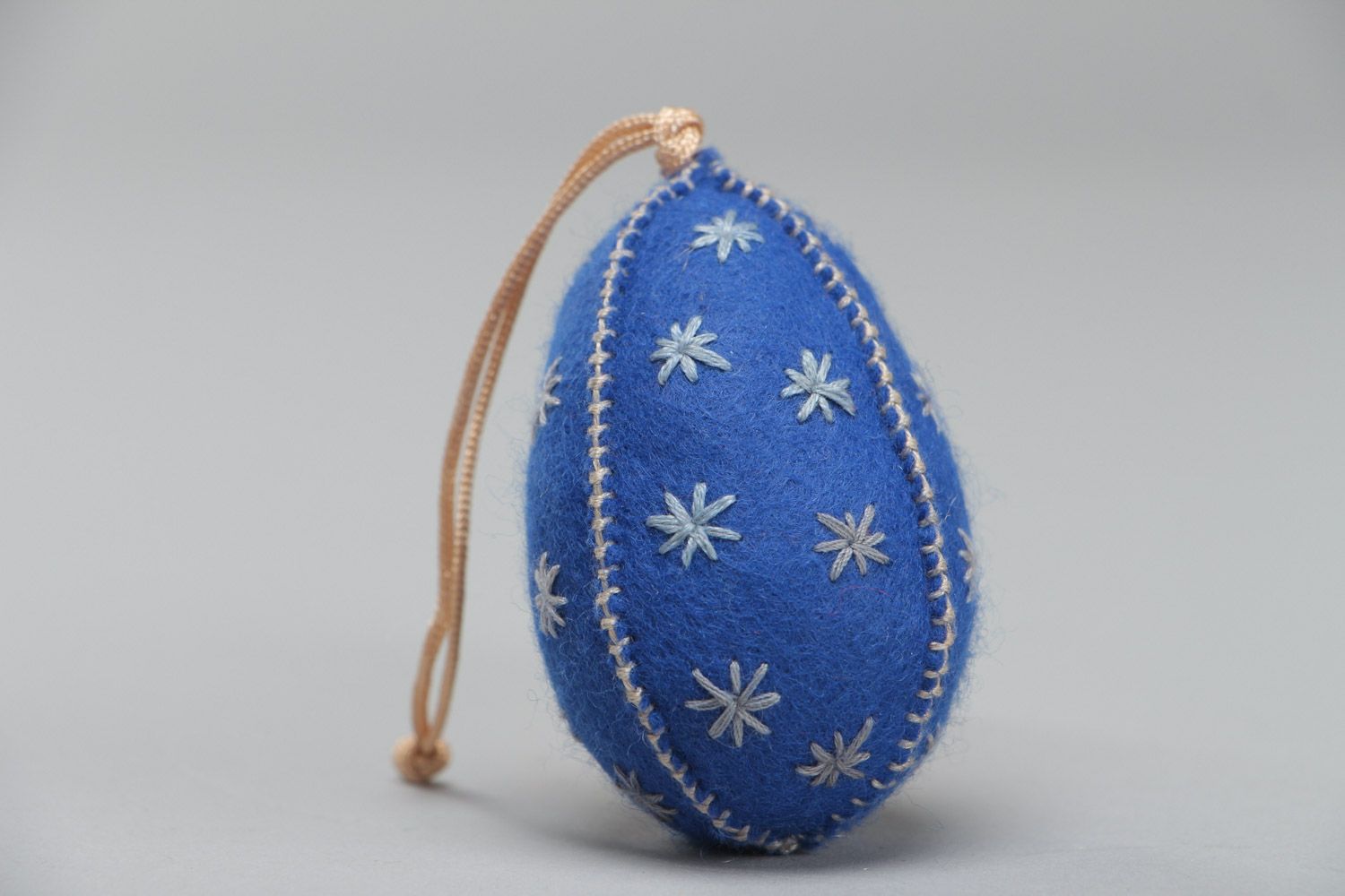 Handmade interior soft wall hanging sewn of blue felt in the shape of Easter egg photo 4