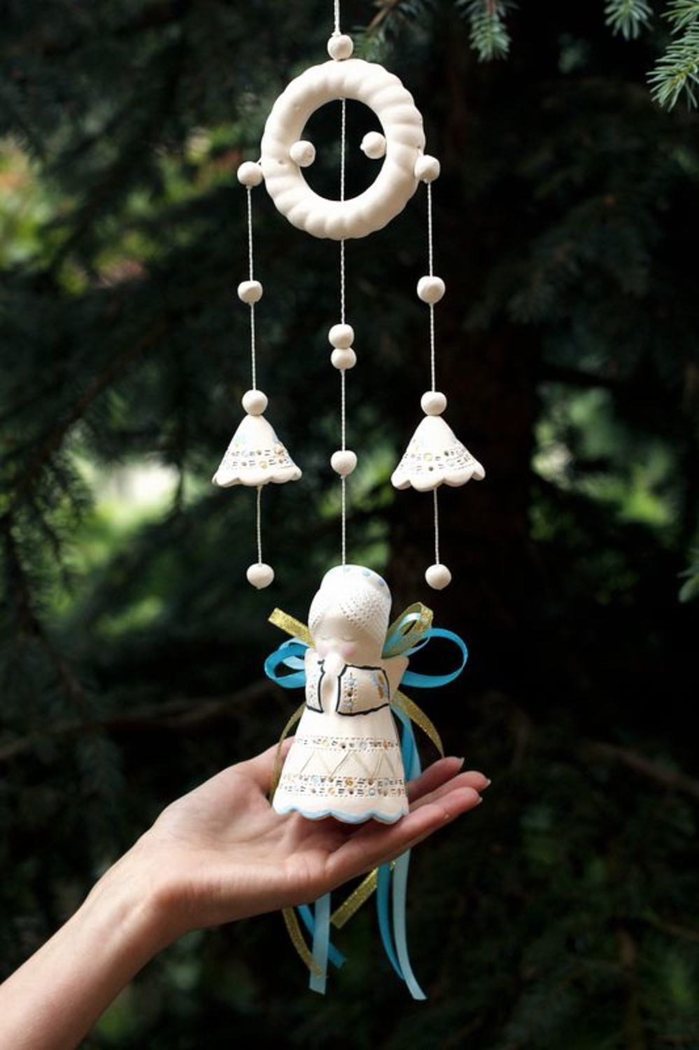 Hanging bells made from white clay photo 2