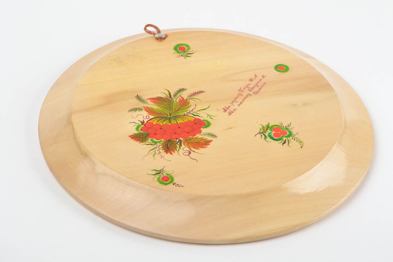 Красивая деревянная тарелка с Петриковской росписью ручной работы круглая фото 3