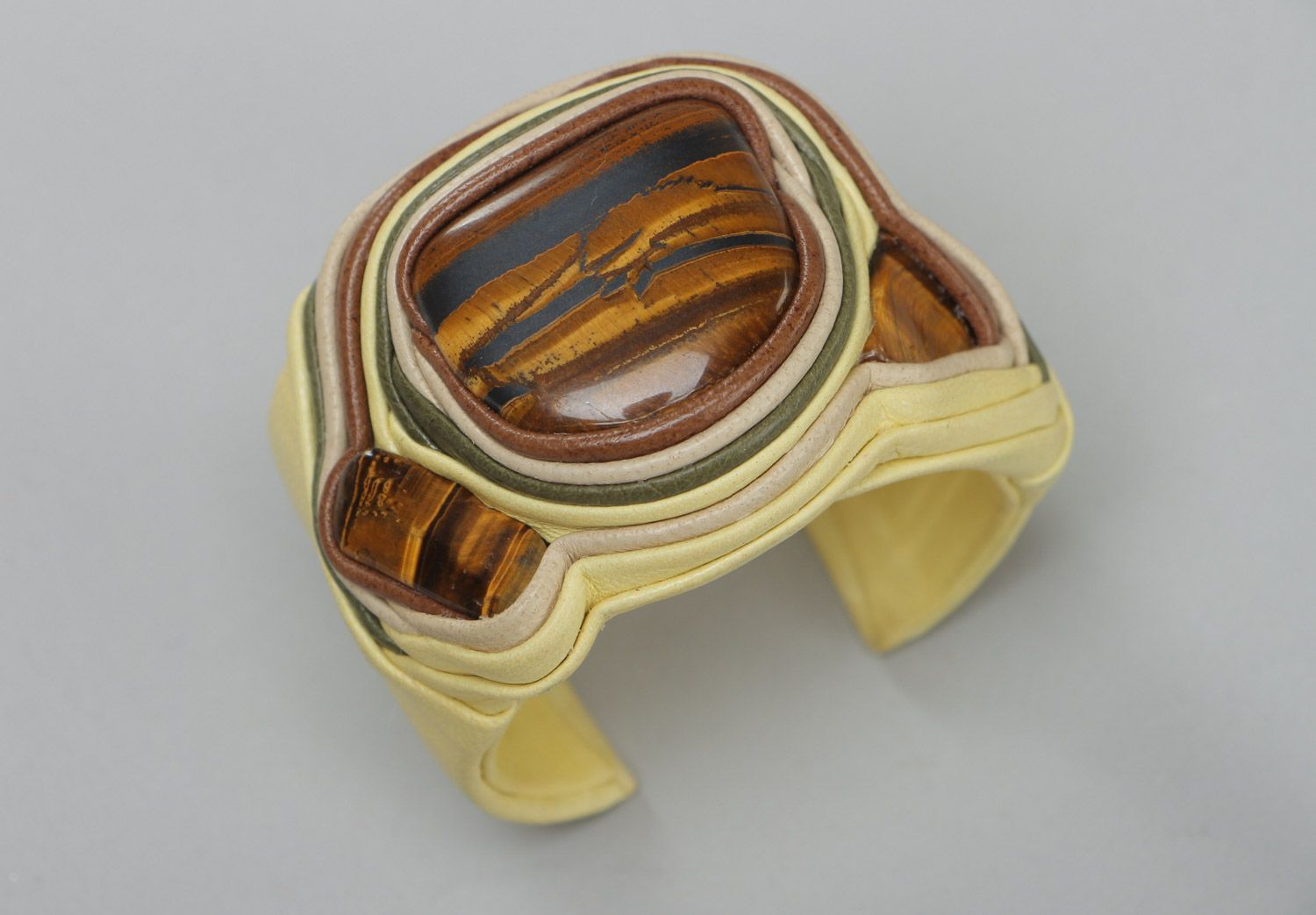 Handmade wide leather bracelet in light color with jaspilites stone adjustable size photo 2