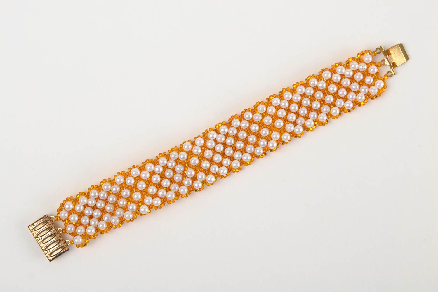 Handmade beaded wide bracelet in golden and white colors photo 3