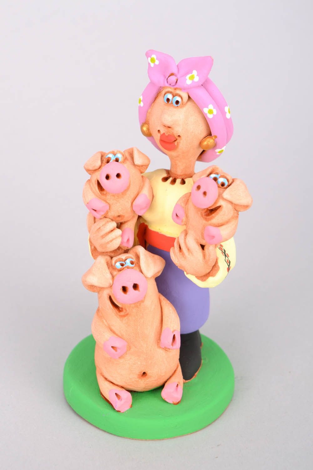 Funny statue Cossack Woman with Pigs photo 3
