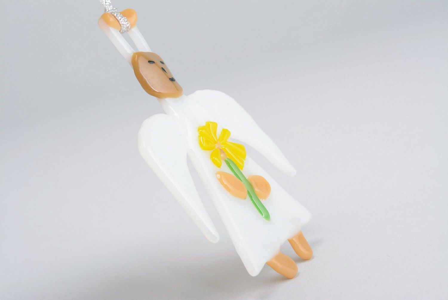 Новогодняя игрушка Ангел с цветком фото 5