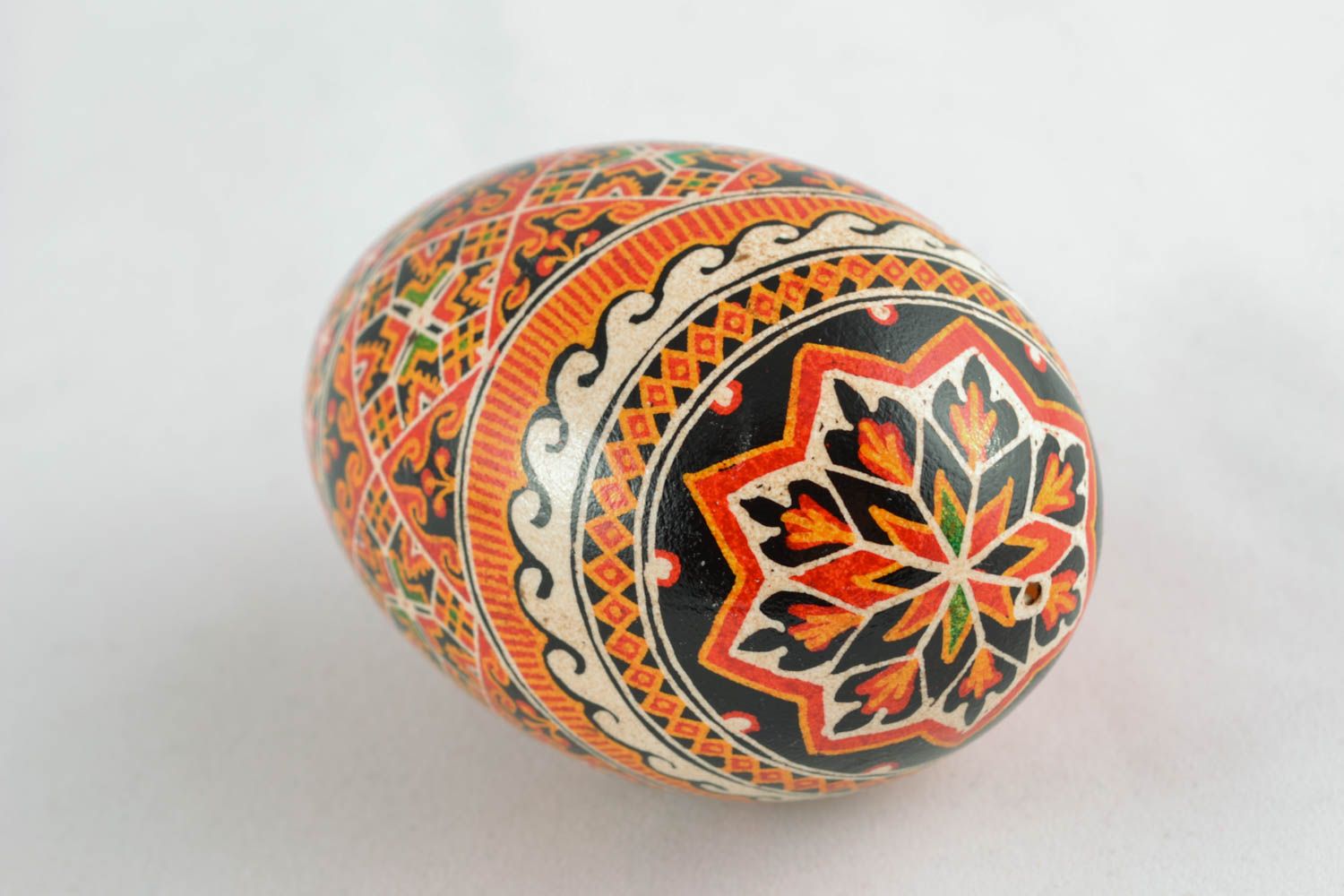 Painted goose egg with ornaments photo 1