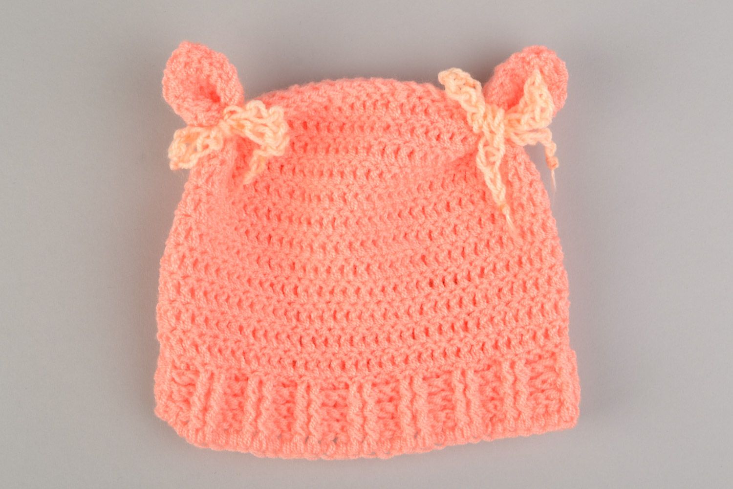 Handmade cute baby hat crocheted of pink acrylic threads with ears  photo 3