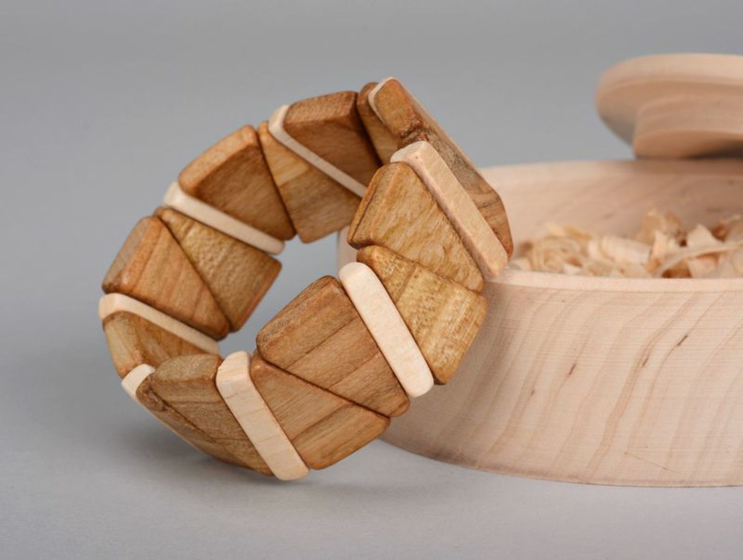 Wooden bracelet on elastic band made from triangular pieces photo 1