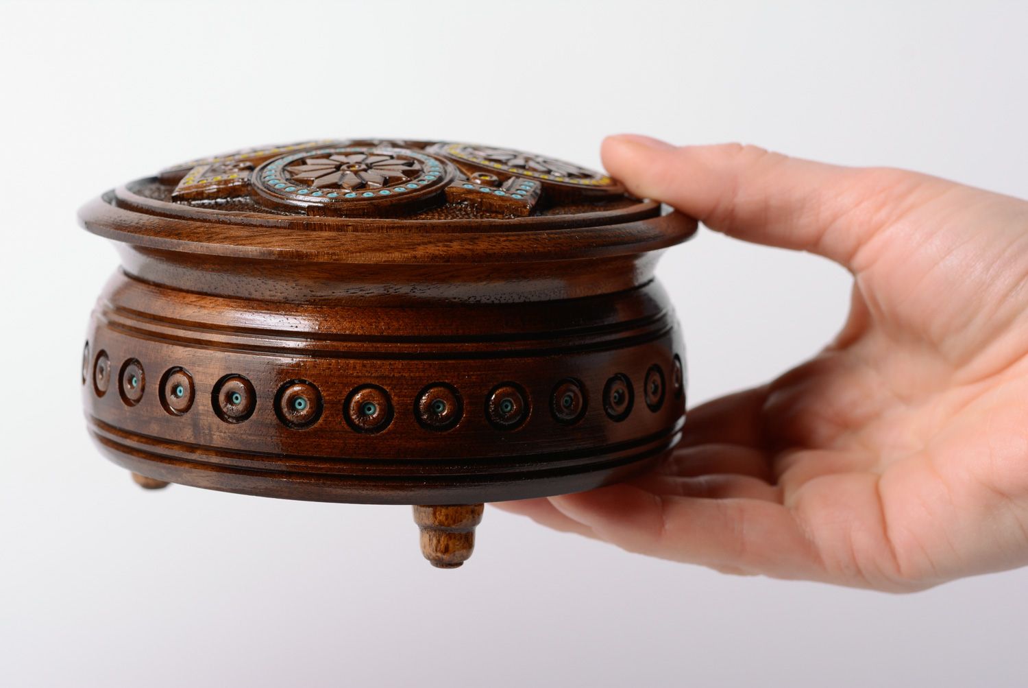 Dark wooden handmade jewelry box of round shape with art carving and bead inlay photo 5