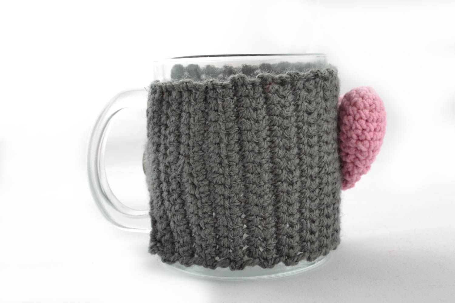 Glass cup with cozy photo 1