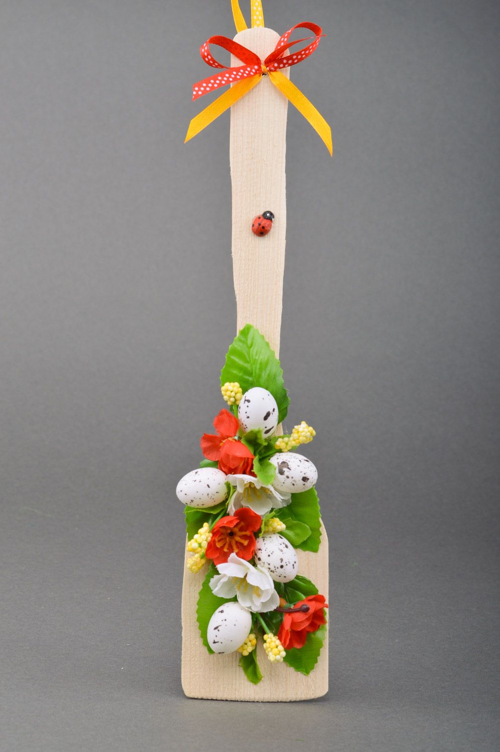 Handmade decorative wooden spatula with flowers and hollow eggs for wall decor photo 5