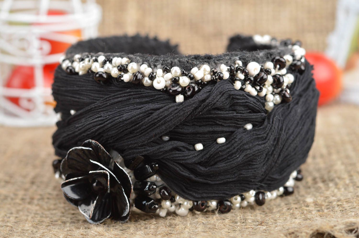 Fabric handmade wide bracelet in black color decorated with flower and beads photo 1