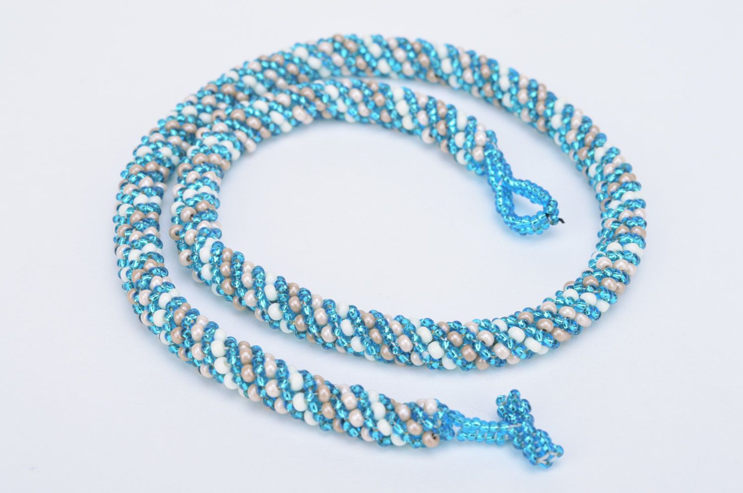 Handmade tender beaded cord necklace in blue and white colors for women photo 5