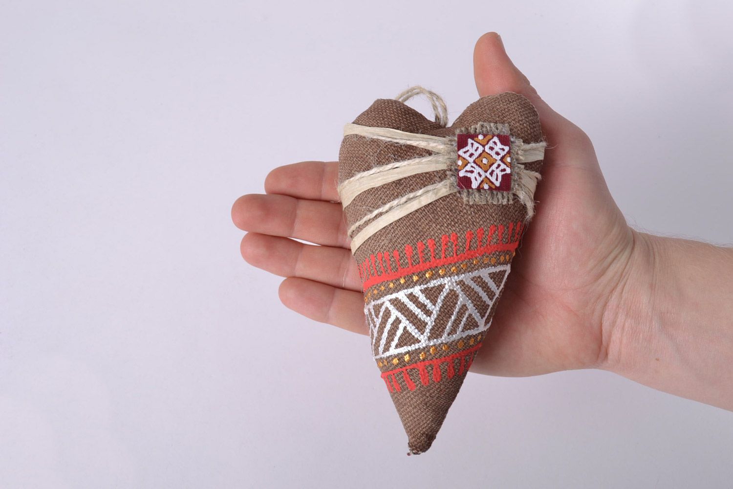 Handmade decorative heart-shaped wall hanging sewn of fabric with coffee aroma photo 5