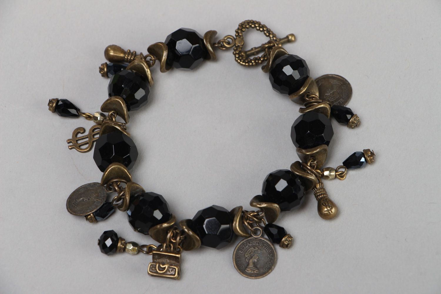 Handmade wrist bead bracelet with glass charms in dark color palette for women photo 2