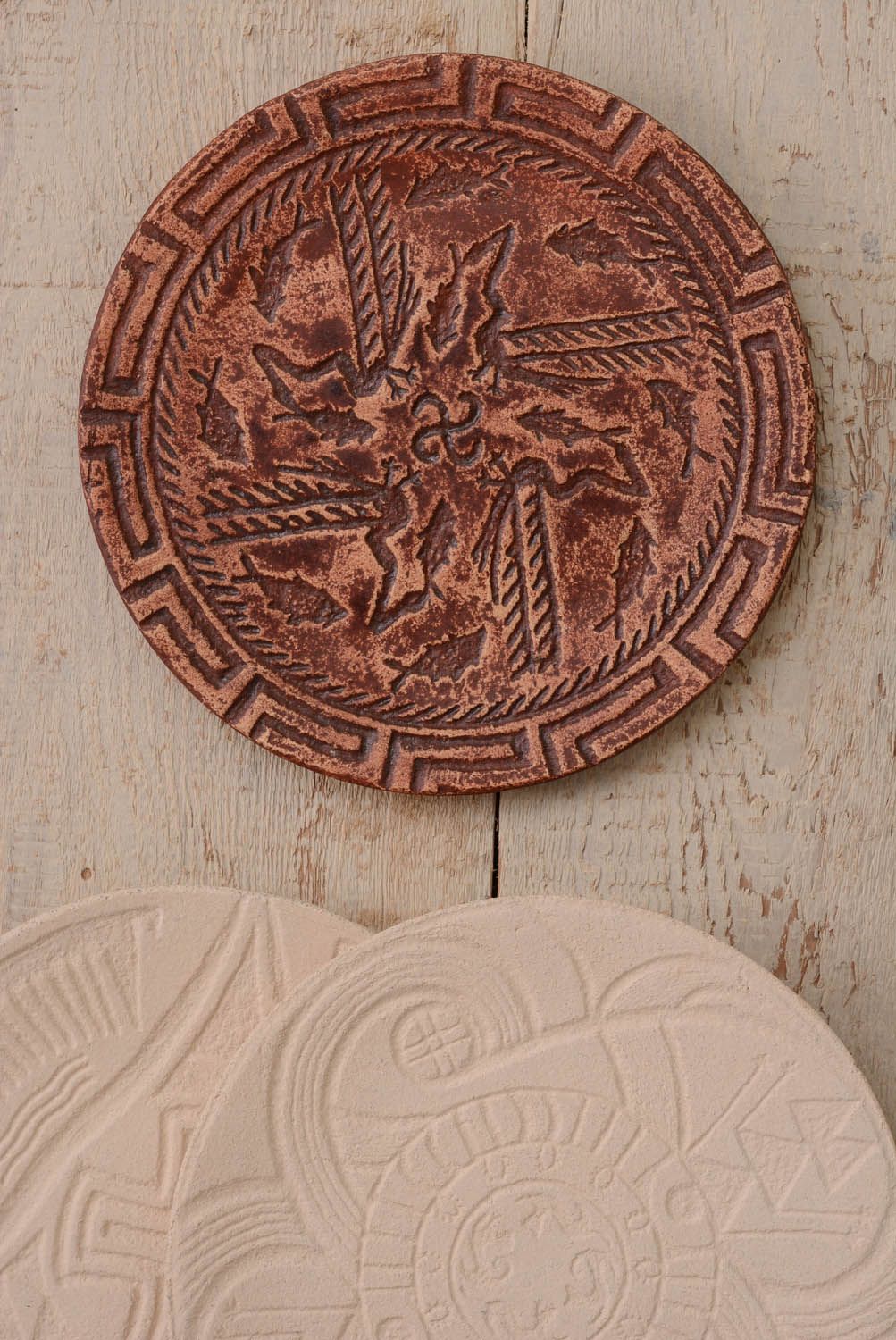 Plato de barro-amuleto Dragones foto 3