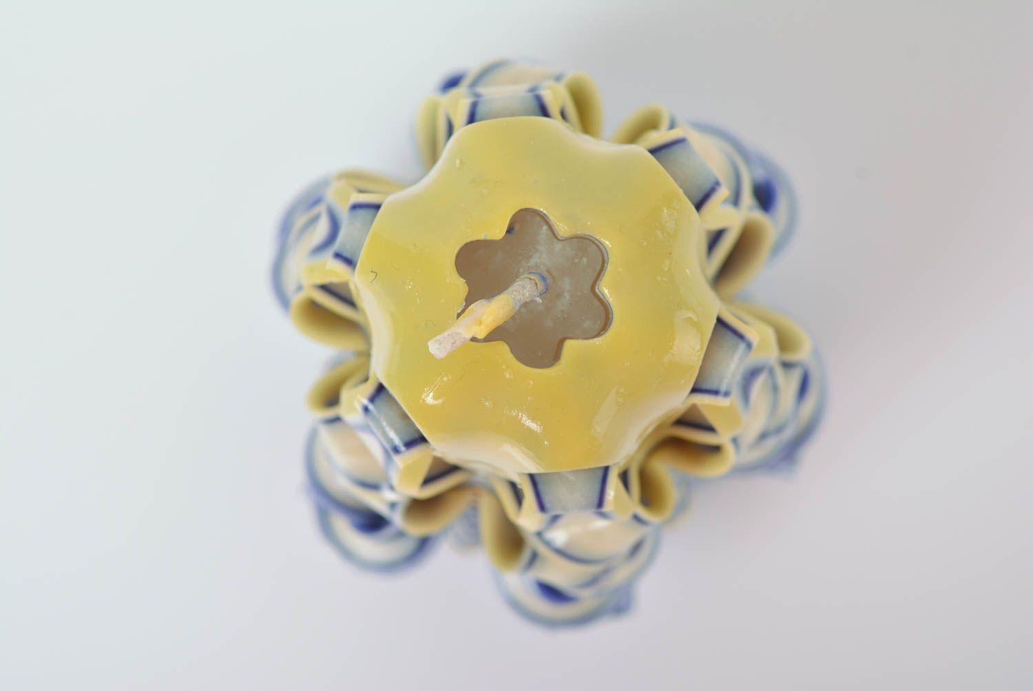 Blue and yellow handmade beautiful carved paraffin candle photo 4