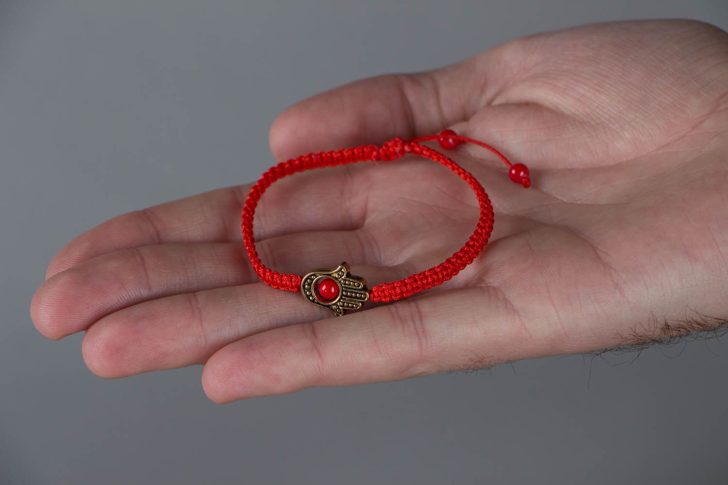 Woven bracelet with hamsa photo 4