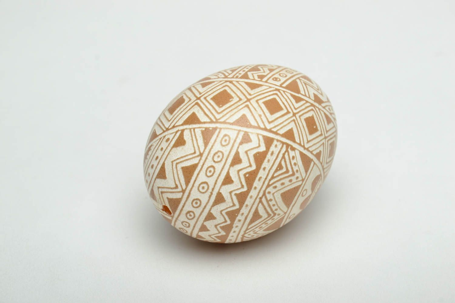 Easter egg with traditional Ukrainian symbolics made using vinegar etching technique photo 3