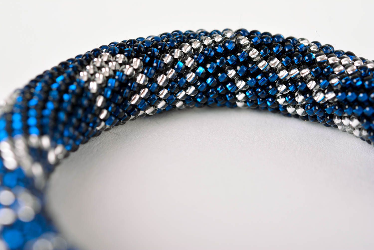 Beaded cord all size bracelet in dark blue color photo 3