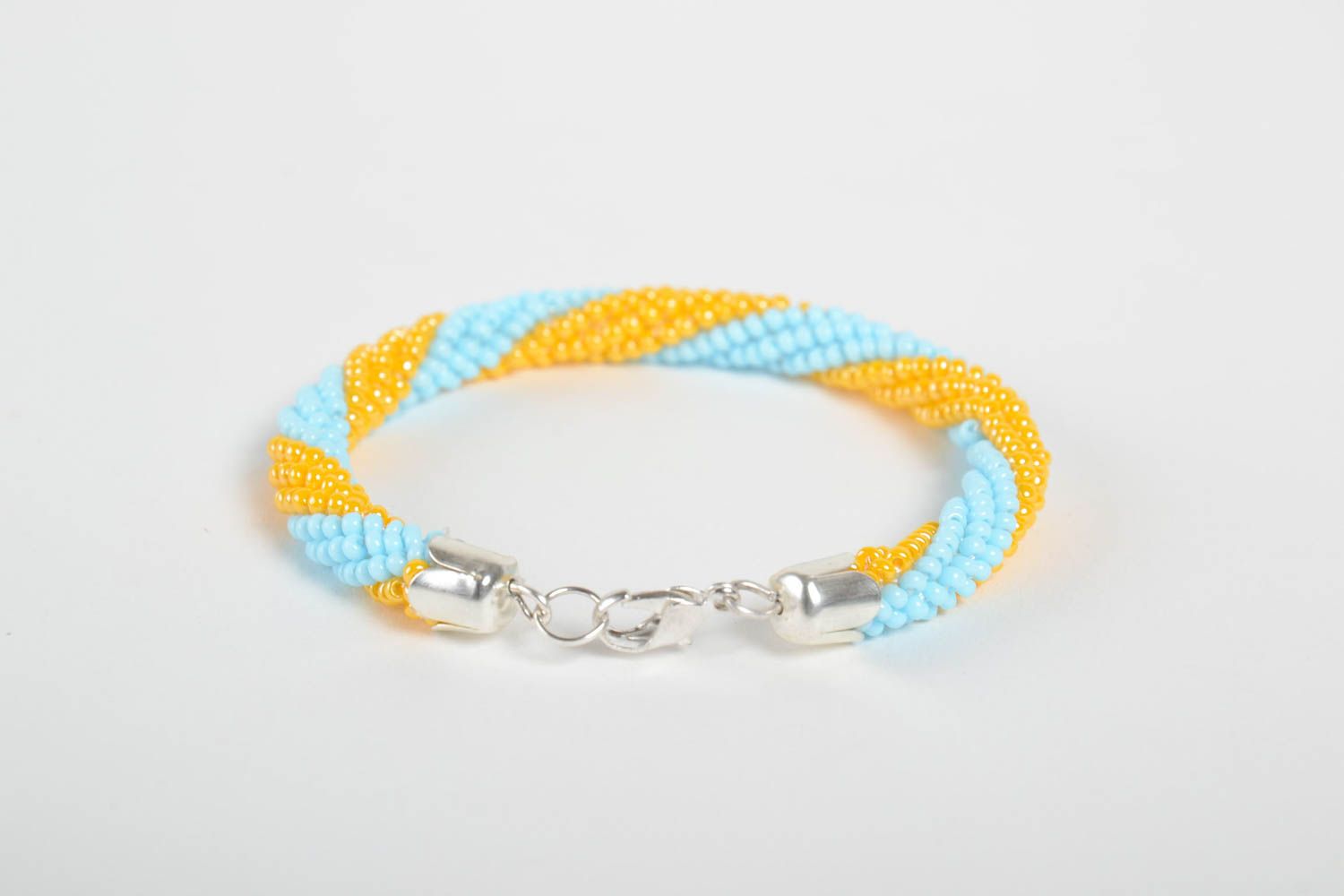 Homemade beaded cord all-size bracelet made of yellow and light blue beads photo 5