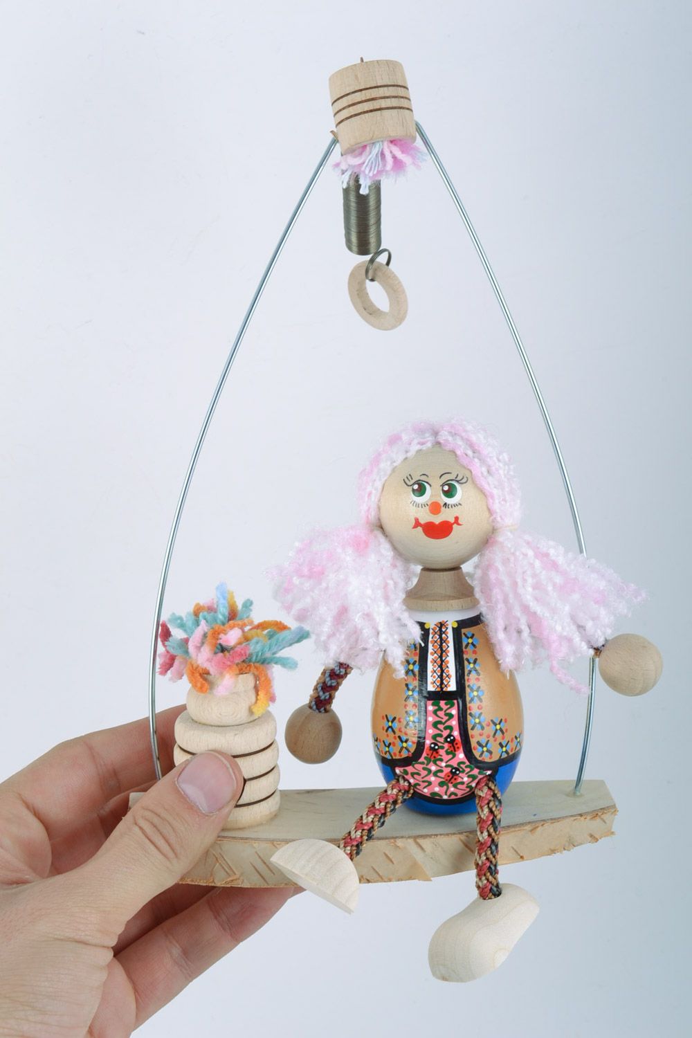 Деревянная игрушка с качелями и девочкой ручной работы с росписью детская фото 2