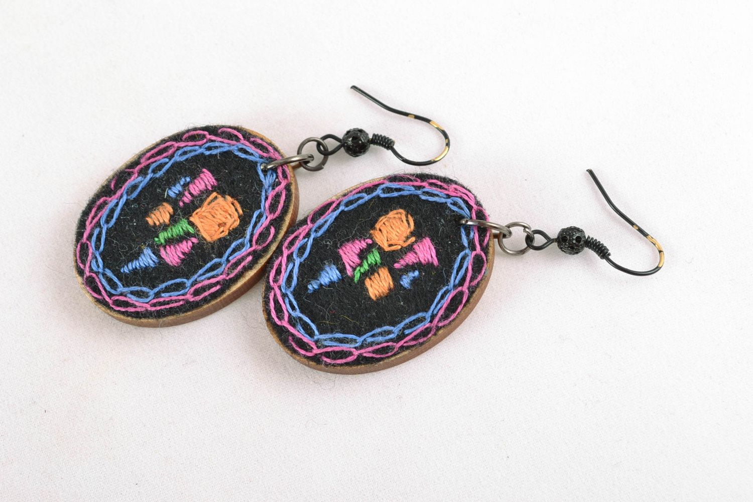 Designer fashionable embroidered earrings of oval shape photo 3