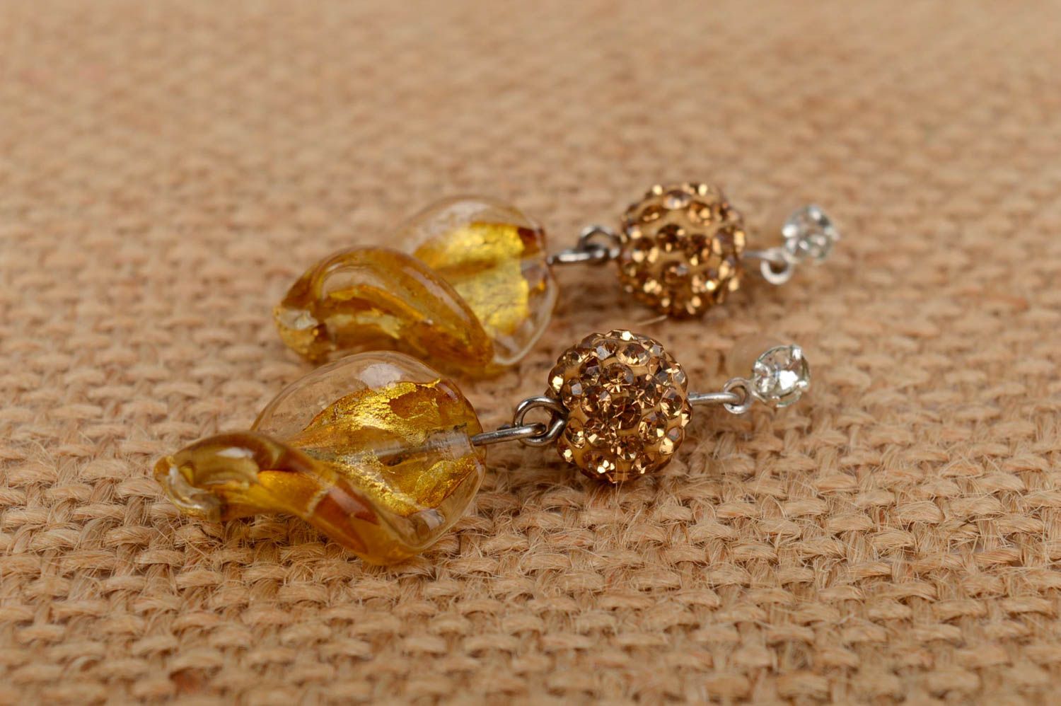 Beautiful unusual Venetian glass stud earrings of gold color photo 1