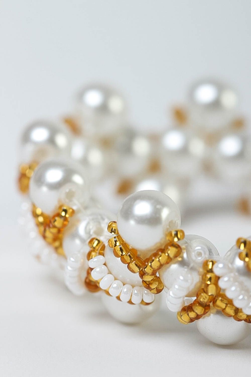 Girls charm beaded bracelet in white and golden colors  photo 3