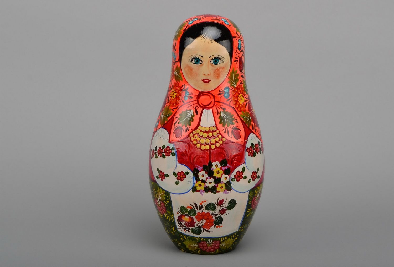 Wooden ethnic matrioshka doll photo 1