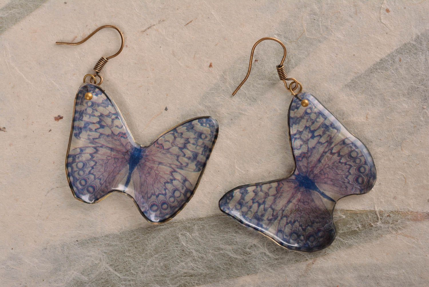Unusual small handmade designer epoxy earrings in the shape of butterflies photo 1