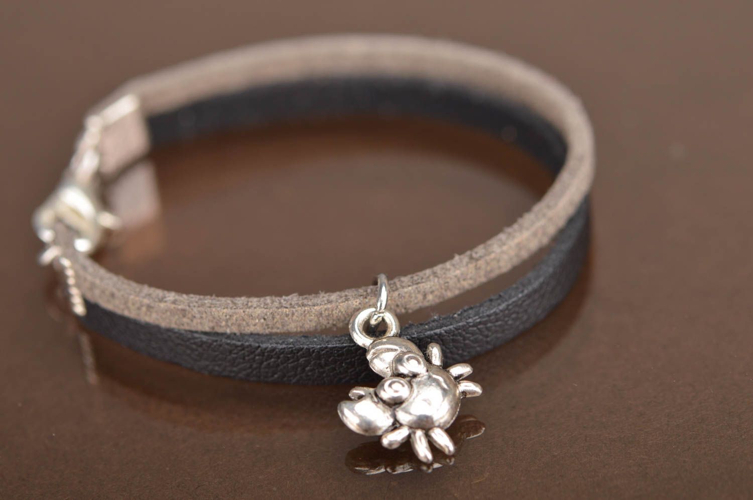 Handmade designer genuine leather cord bracelet black and beige with metal charm photo 2
