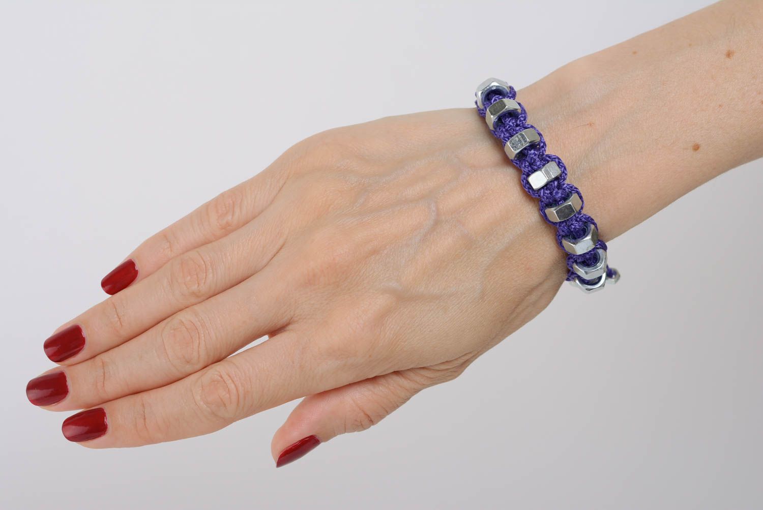 Handmade macrame bracelet made of cord and screw nuts blue drawstring accessory photo 3