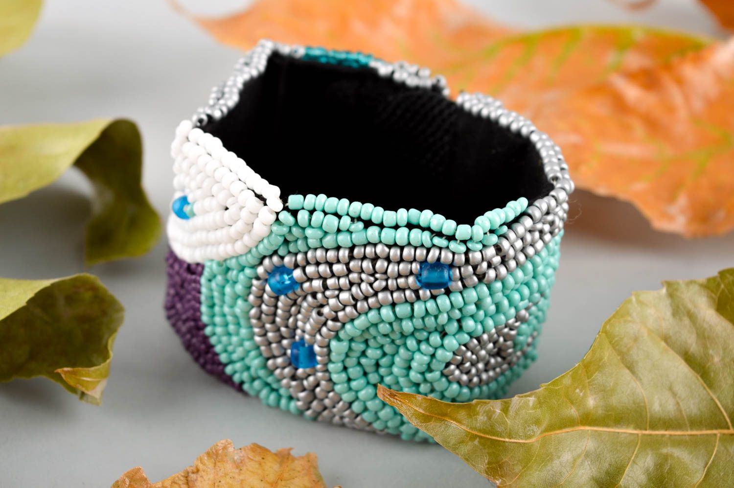 Stylish handmade beaded wide wrist bracelet in turquoise, white and black colors photo 1