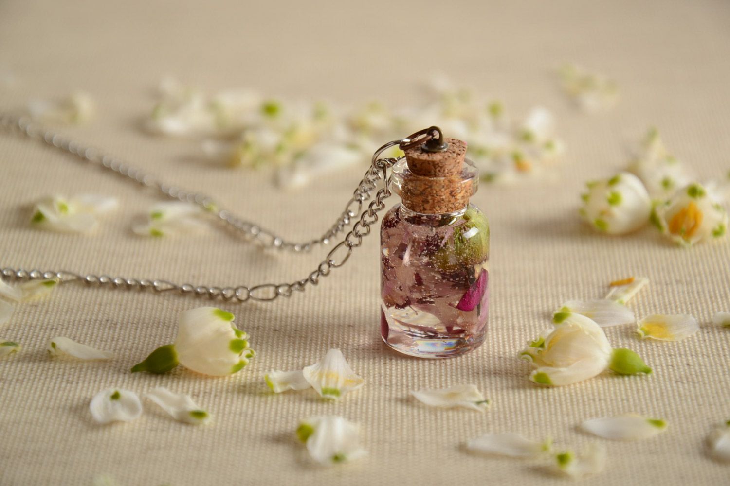 Handmade transparent neck pendant with real flowers inside coated with epoxy photo 1