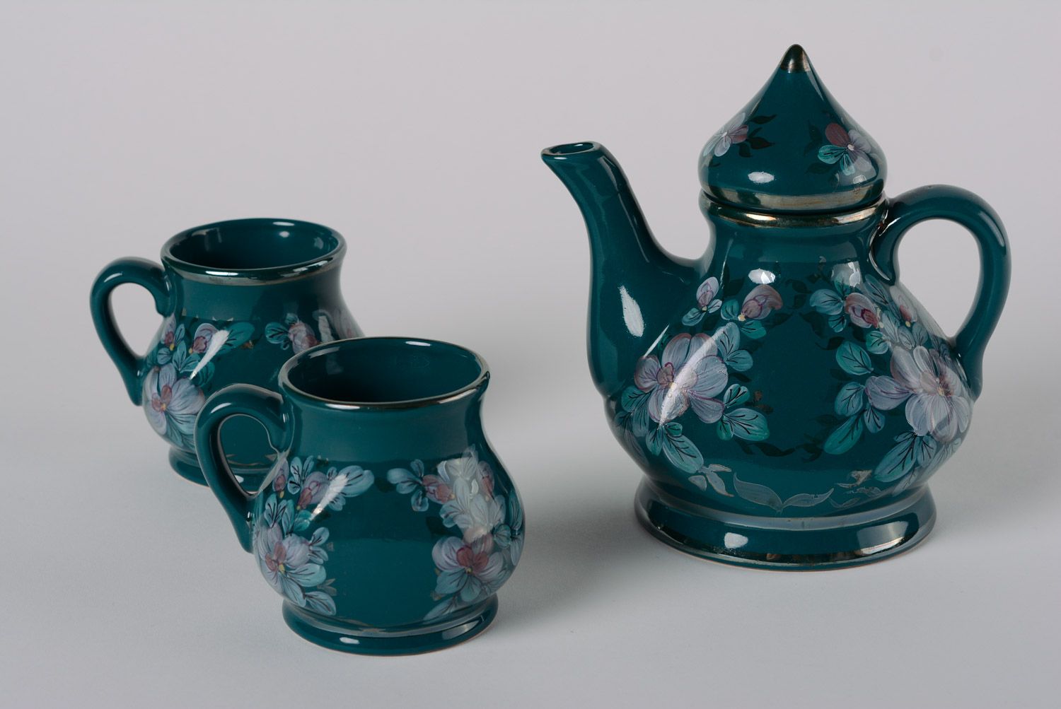 Decorative elegant dark blue porcelain teapot and two cups with flower pattern  photo 5