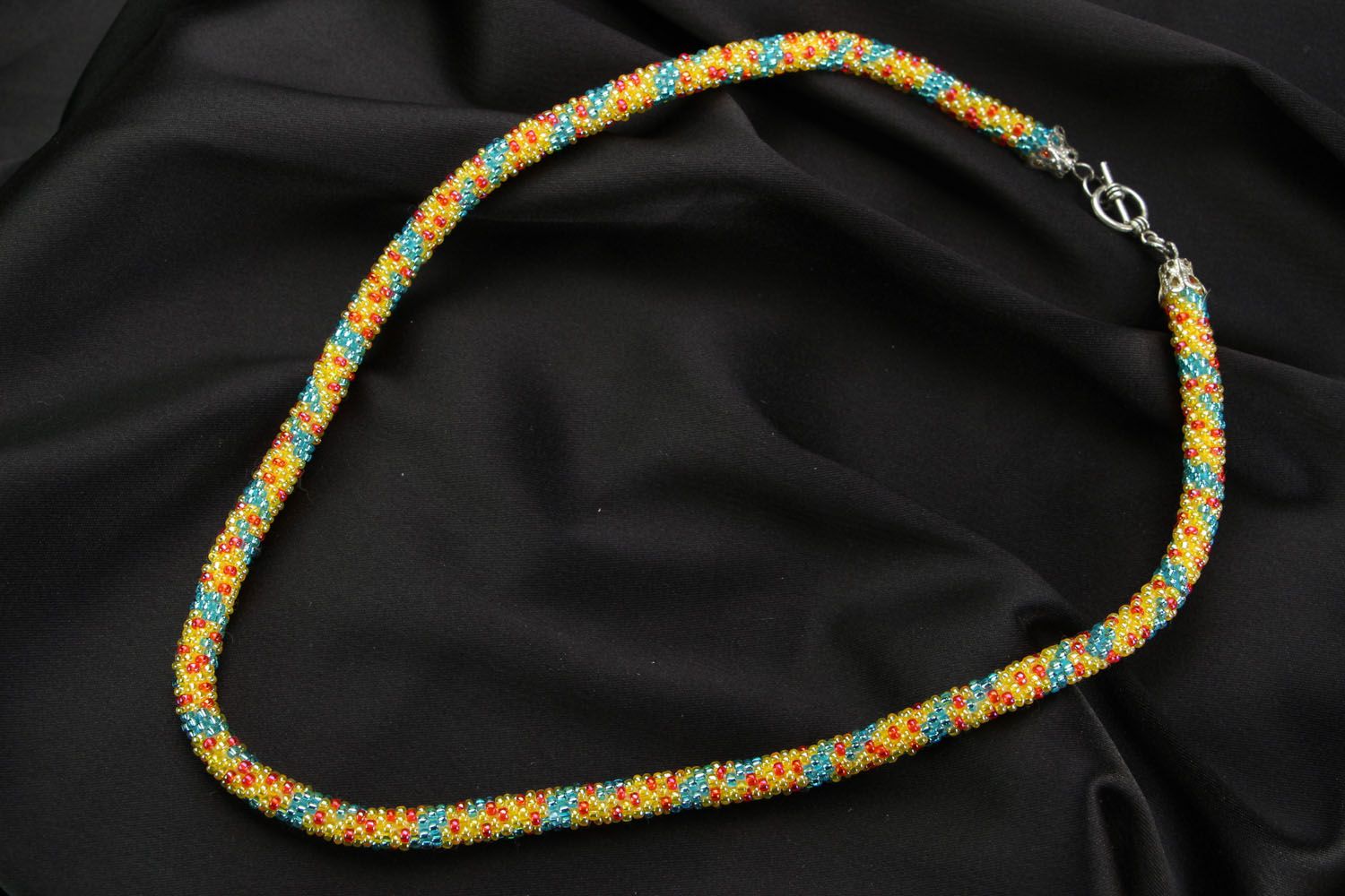 Unusual beaded cord necklace photo 1