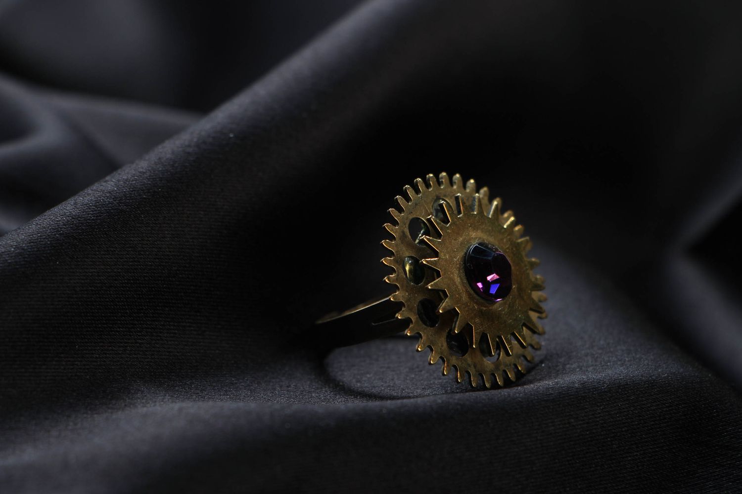 Metal ring in steampunk style with gear wheels photo 1