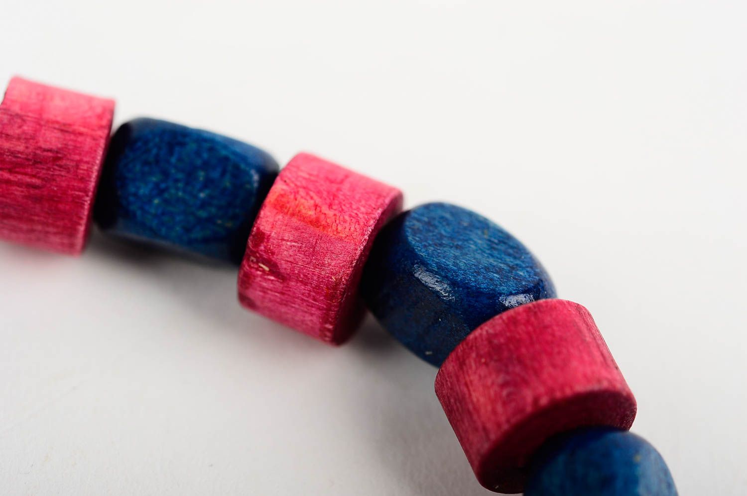 Stylish striped handmade beaded wooden bracelet wooden in red and blue color photo 4