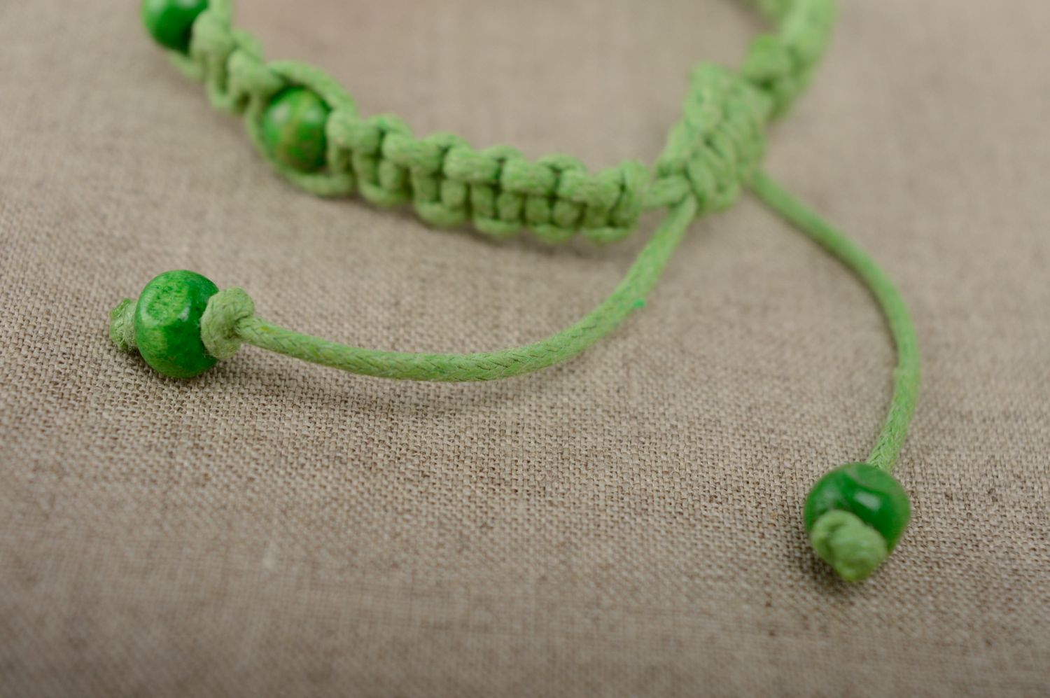Handmade macrame bracelet with wooden beads photo 4