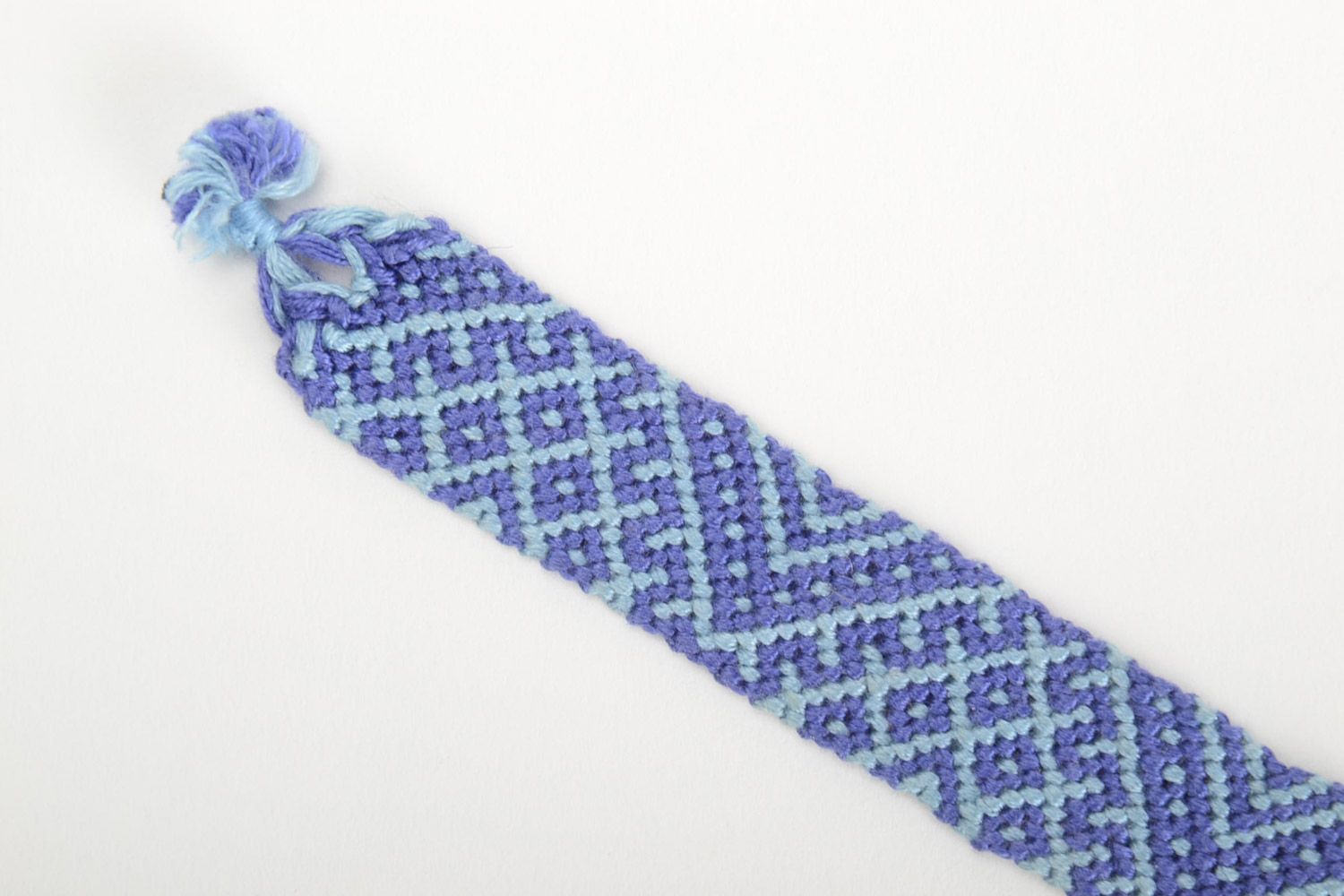 Handmade friendship wrist bracelet woven of threads in blue color with ties photo 4