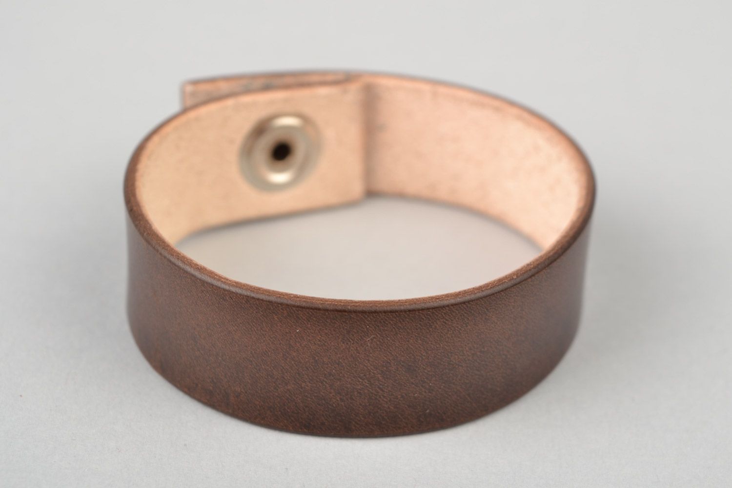 Handmade designer genuine leather wrist bracelet of brown color with stud photo 3