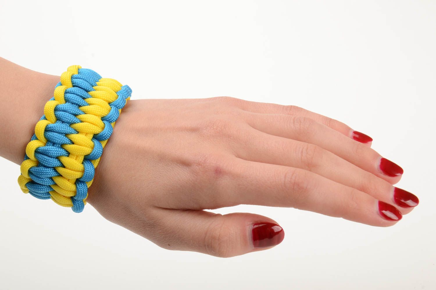 Handmade woven friendship bracelet made of paracord yellow with blue beautiful stylish accessory photo 5
