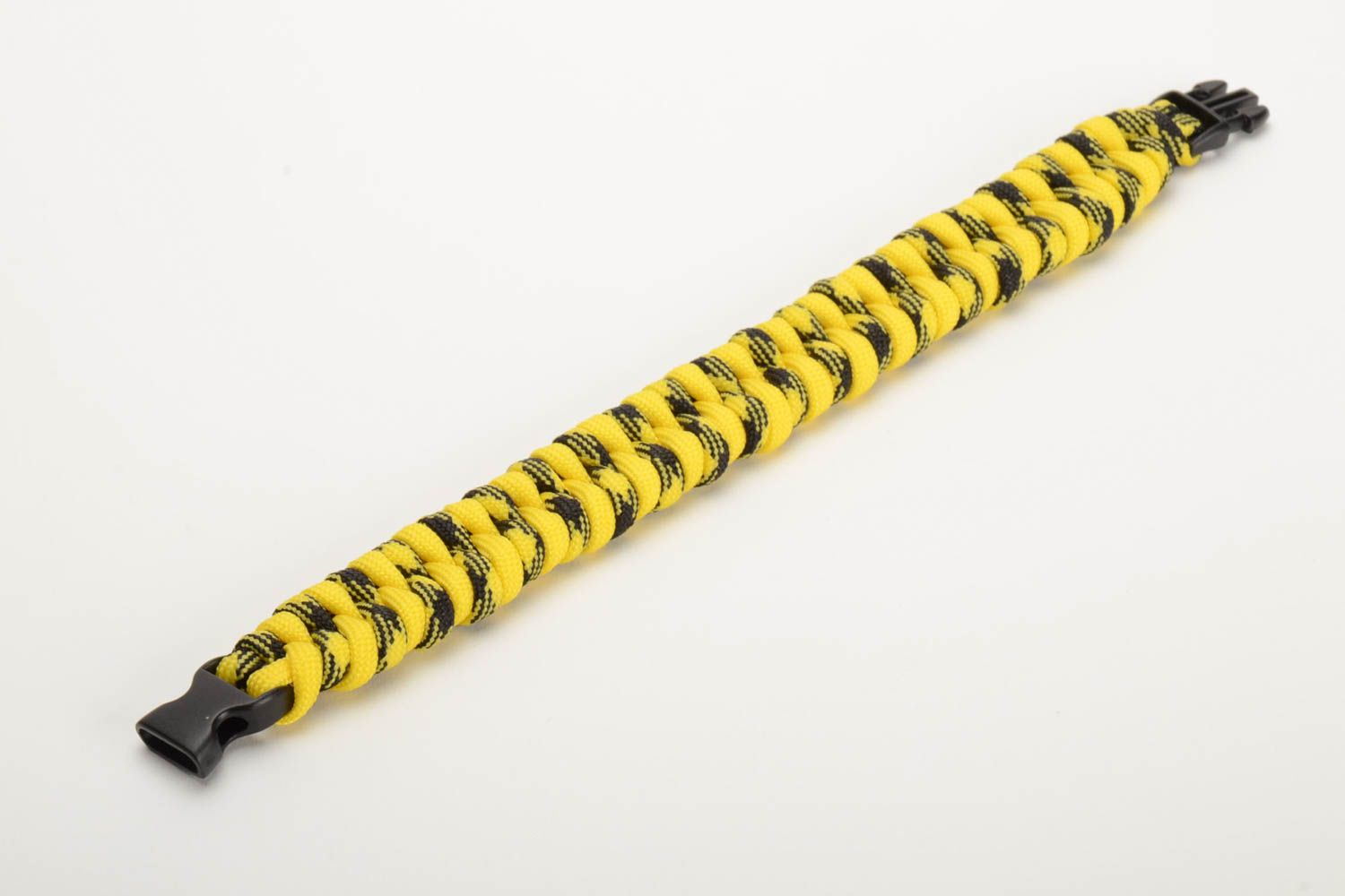 Bright yellow handmade woven paracord bracelet with plastic fastener photo 4
