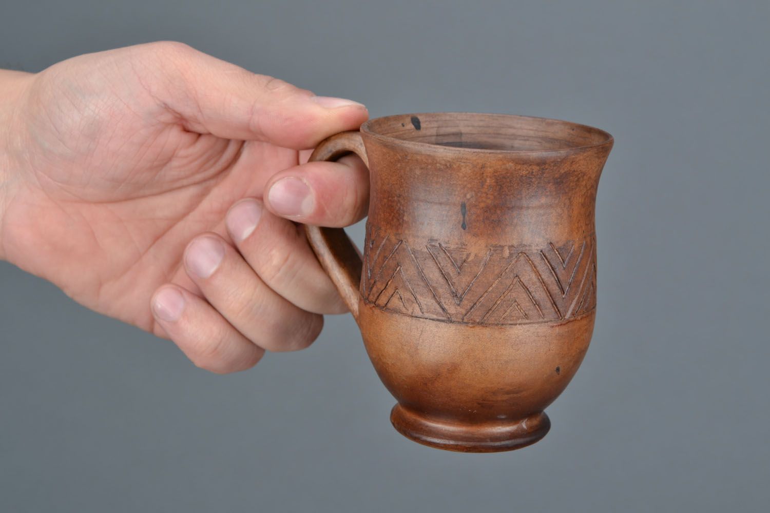 Clay teacup in brown natural color with handle and Greek-style pattern photo 2