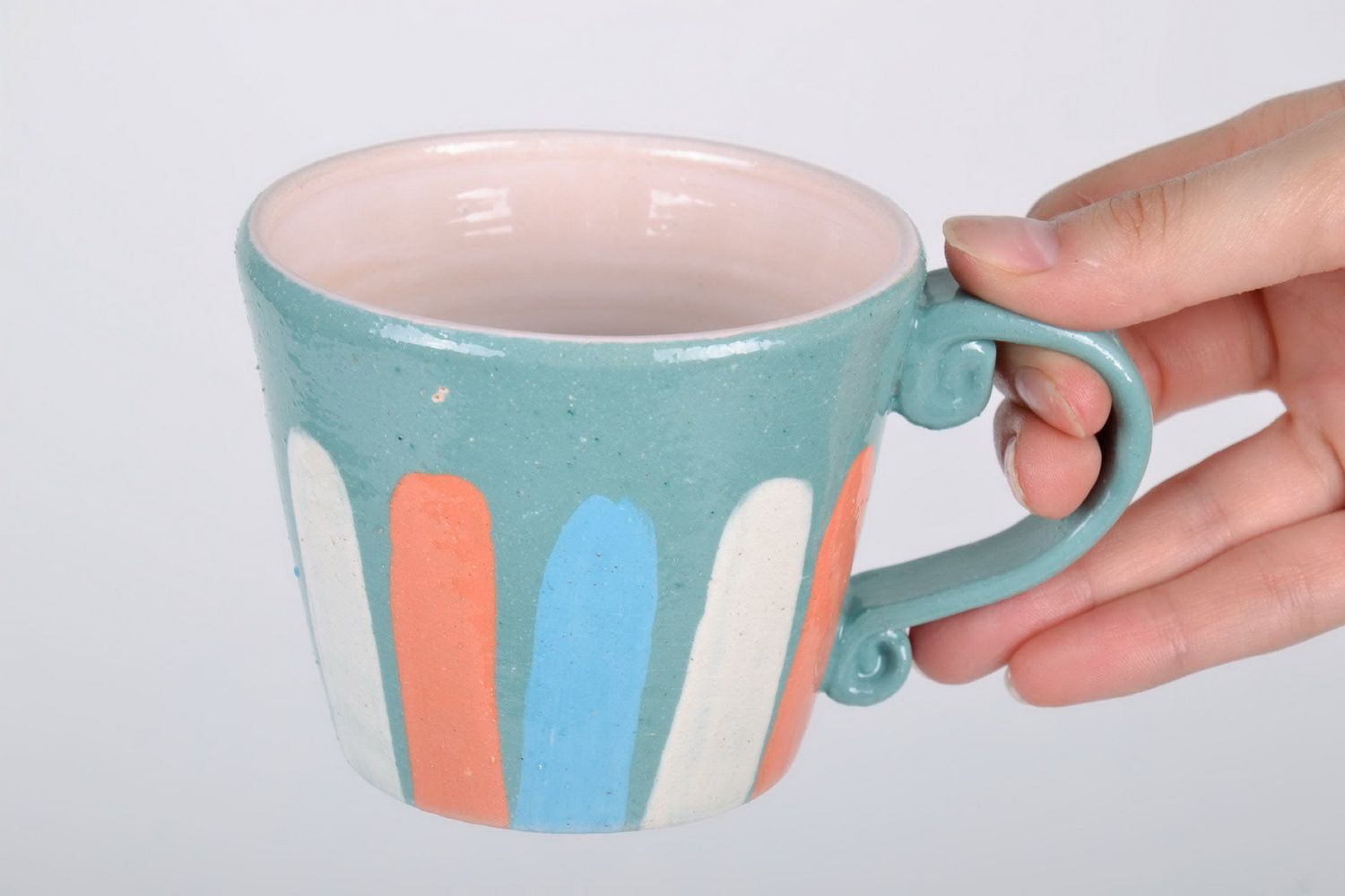 Porcelain cup with handle in blue, white, and orange color photo 5