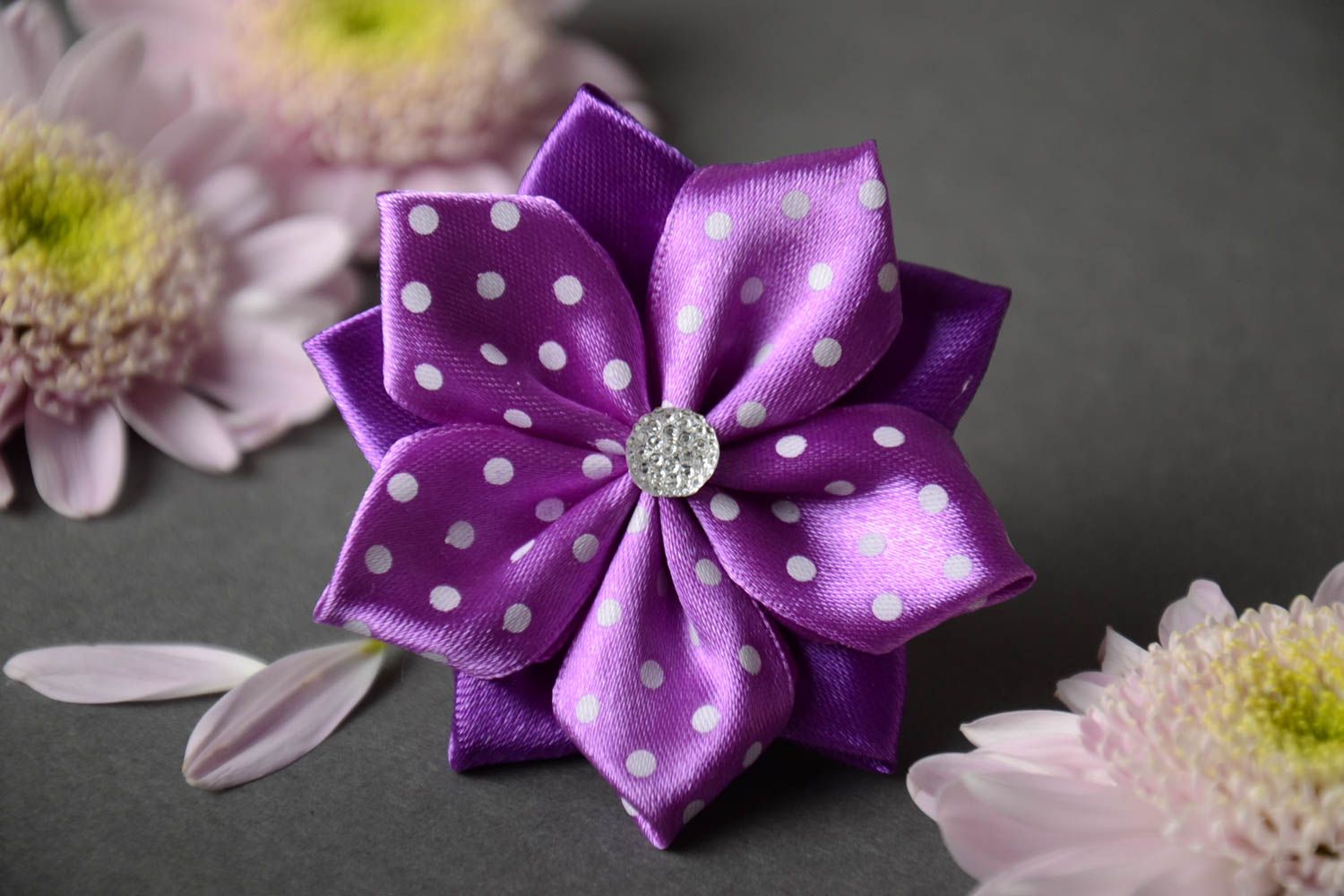 Homemade designer hair band with kanzashi flower folded of violet ribbons photo 1
