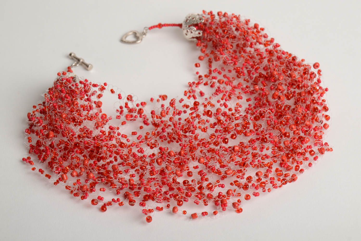 Designer handmade multi row airy crocheted beaded necklace in red color shades photo 3