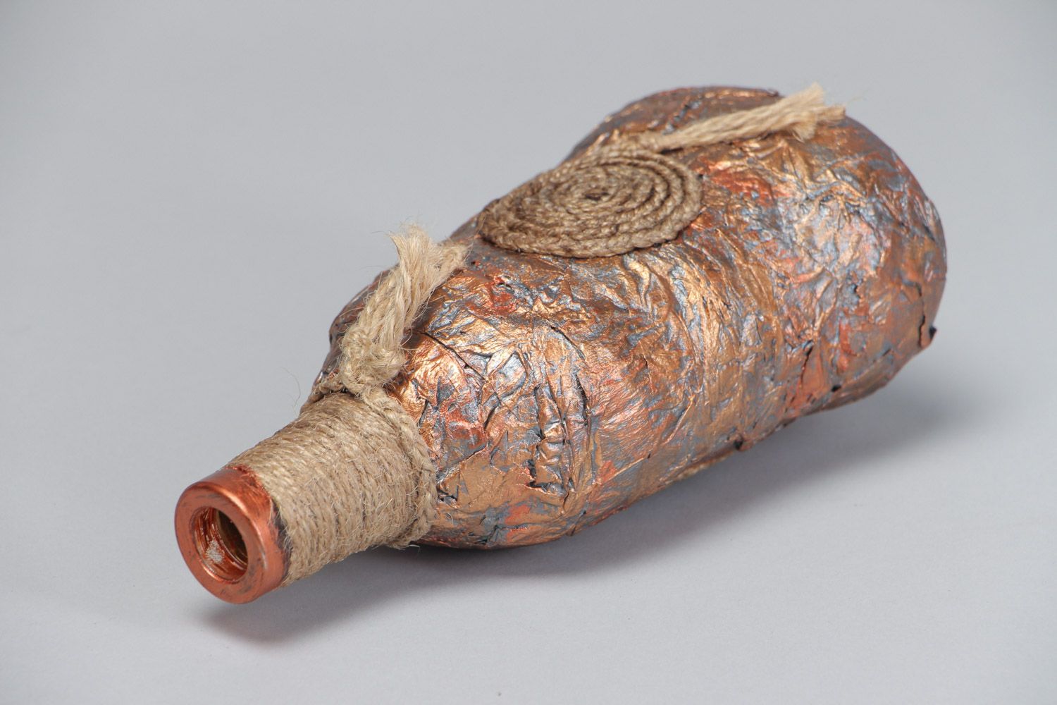 Handmade decorative glass bottle covered with paper and cord in ethnic style photo 4