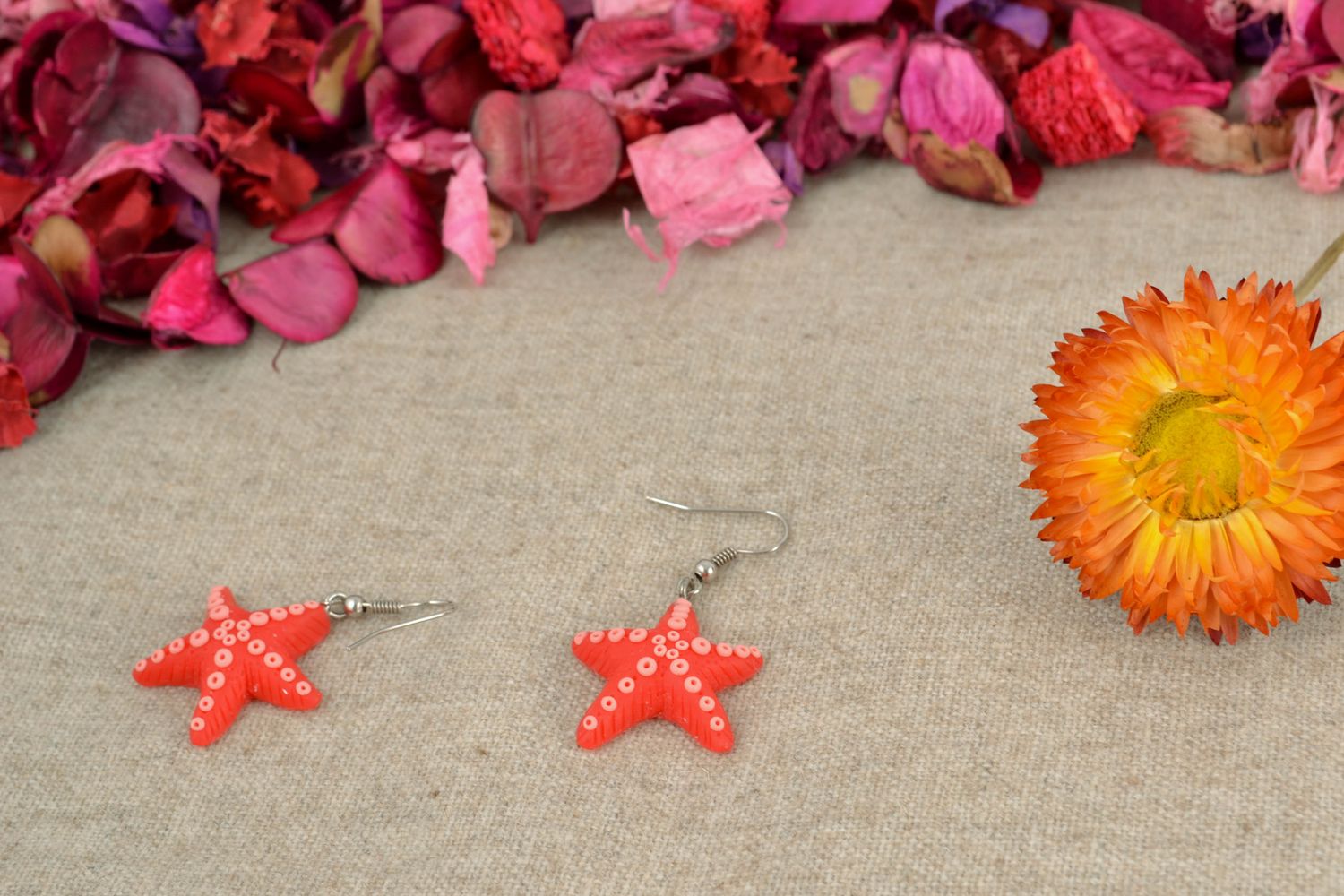 Polymer clay earrings in the shape of starfish photo 1